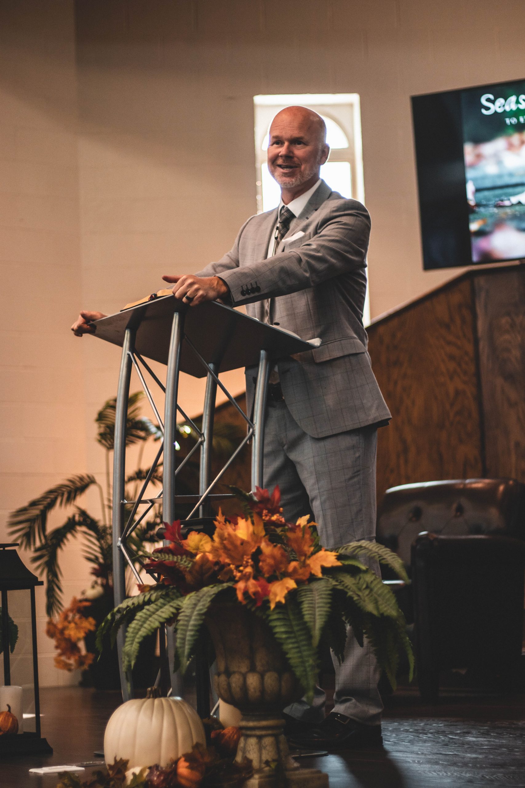 Pastor Treg Spicer speaking at a ministry event